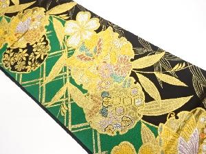 雪輪に蝶・草花模様織出し袋帯